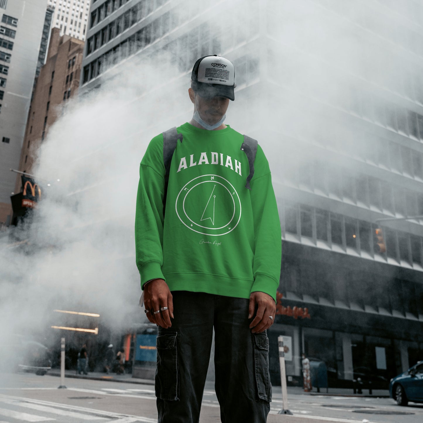Model wearing a No.10 Shemhamphorasch Guardian Angel "Aladiah" Sweatshirt in Irish Green. With the seal of Aladiah in white print on the front.