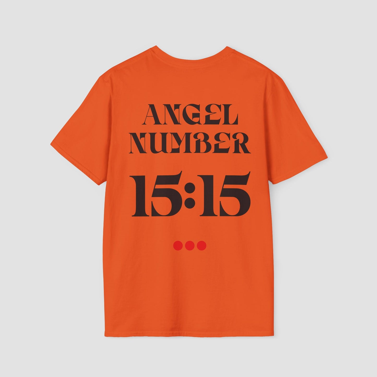 Orange t-shirt with 'ANGEL NUMBER 15:15' printed on the back against a light gray background