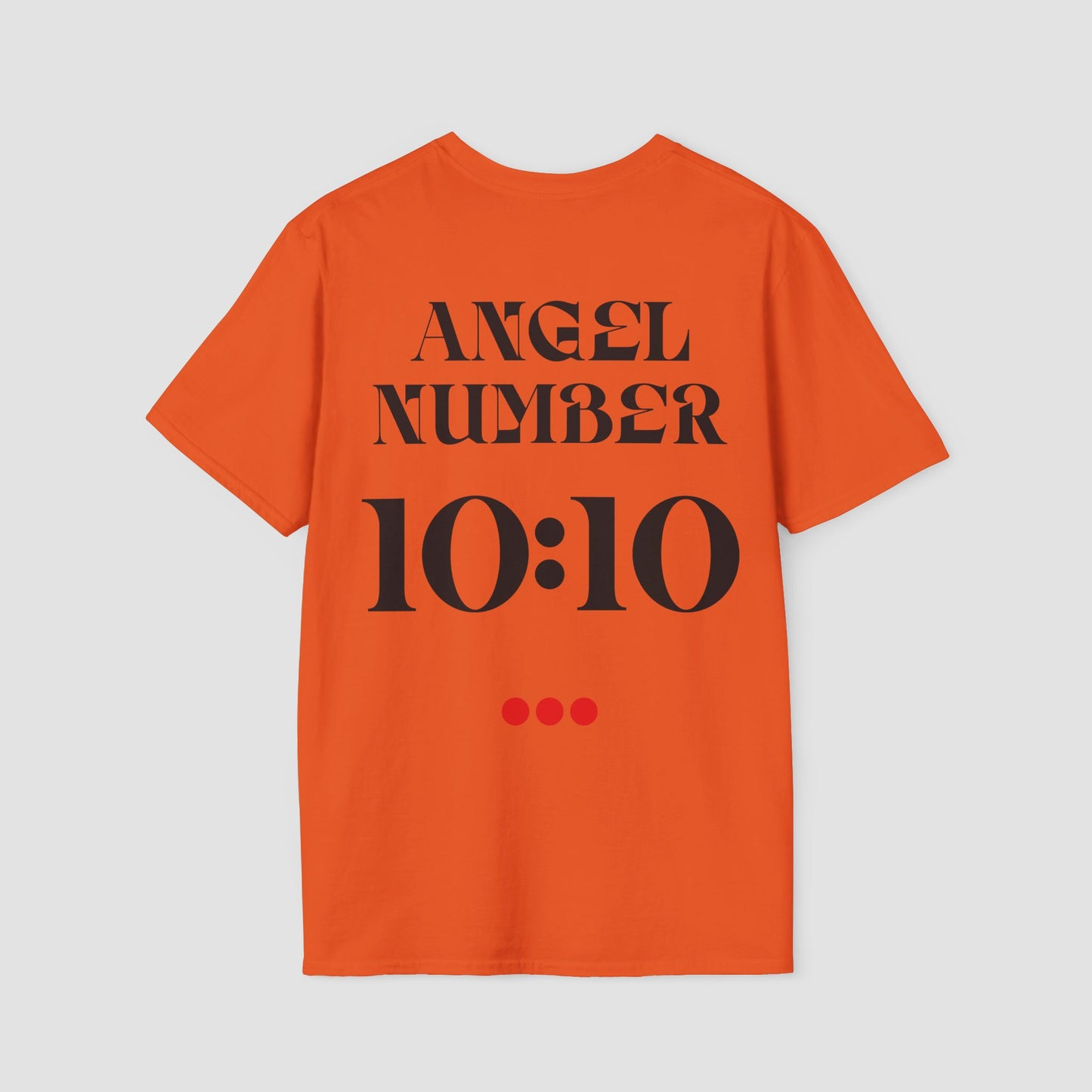 Orange t-shirt with 'ANGEL NUMBER 10:10' text on a light gray background
