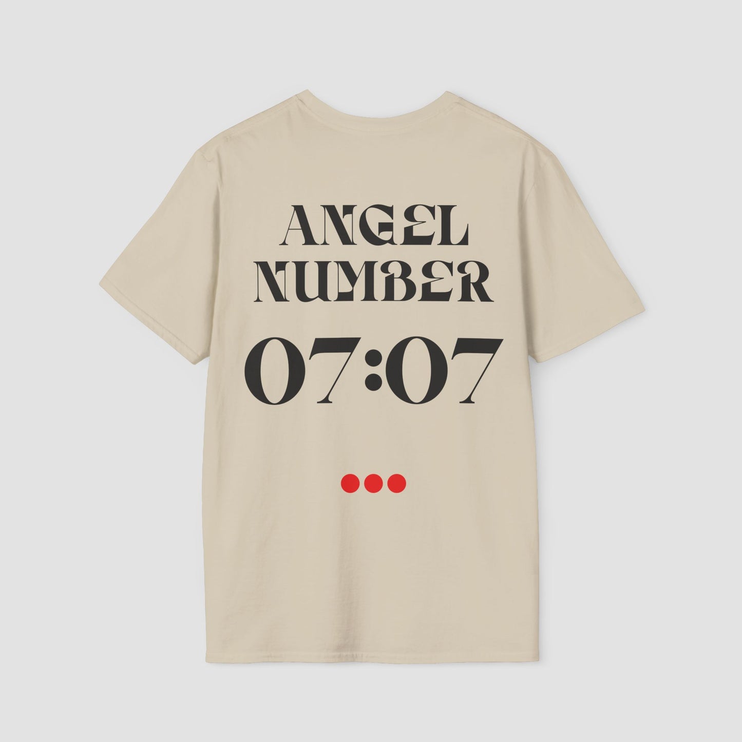 Beige t-shirt with 'ANGEL NUMBER 07:07' printed on the back against a light gray background