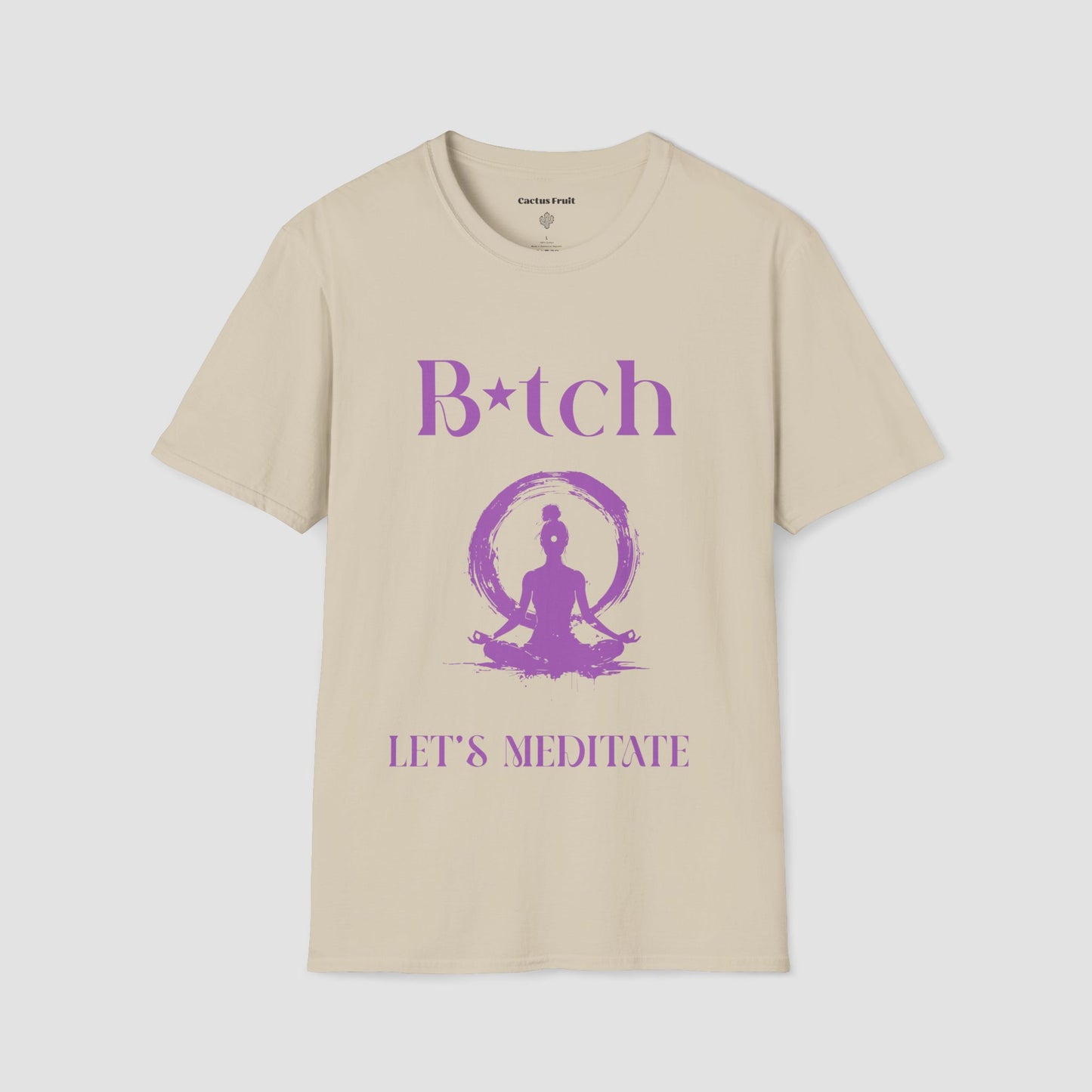 Sand coloured t-shirt with purple silhouette of female sat in a Yoga pose and the words Bitch Let's Meditate.