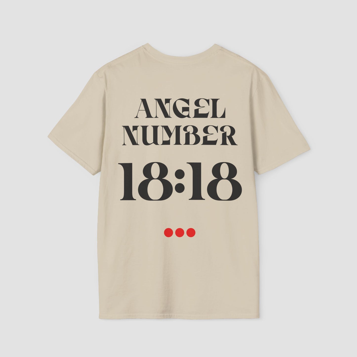 Sand coloured Tee with Angel Number 18:18 depicted on the back in black print and underscored by 3 red dots. A slogan is written across the front saying, "Read the signs" .