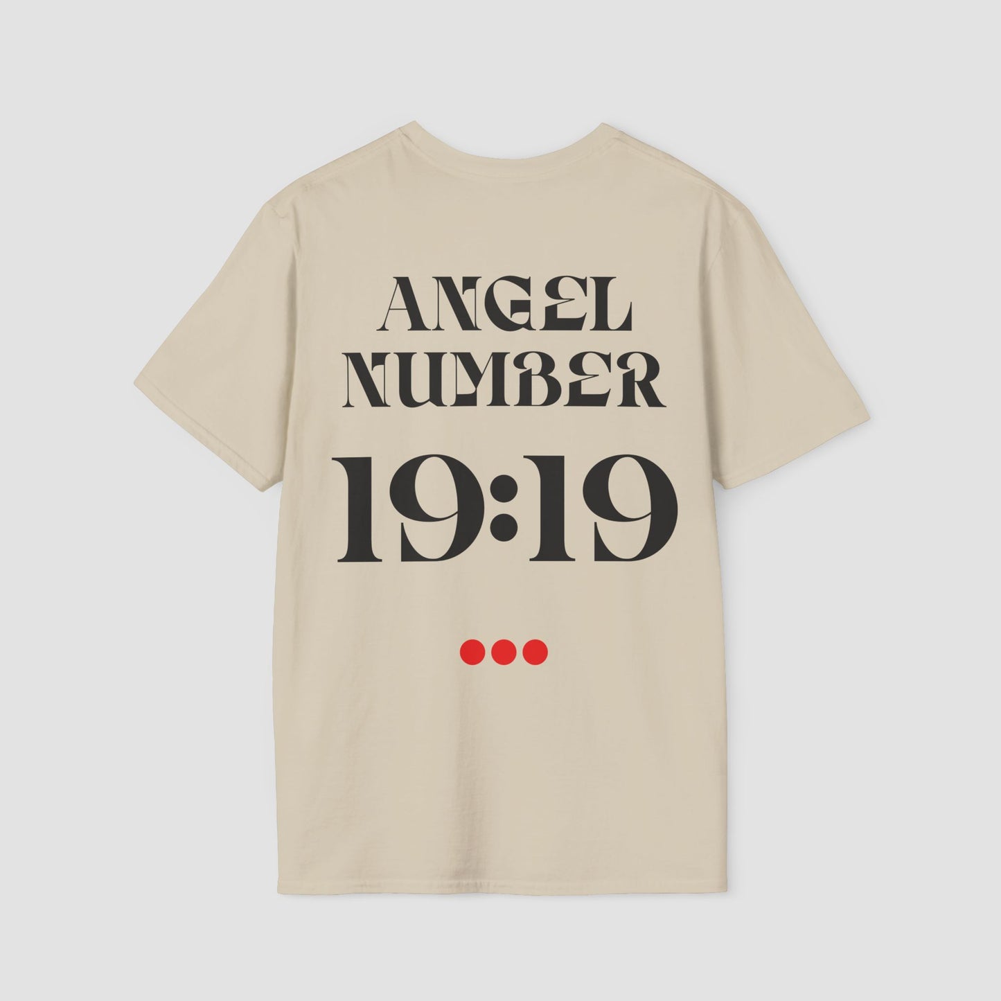 Sand coloured Tee with Angel Number 19:19 depicted on the back in black print and underscored by 3 red dots. A slogan is written across the front saying, "Read the signs" .
