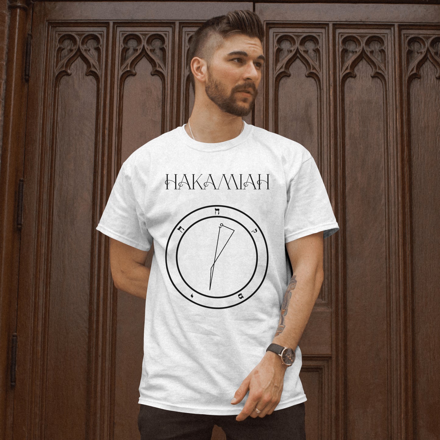 Model wearing No.16 HAKAMIAH Shem Hamephorash Guardian Angel T-Shirt in White with symbol of HAKAMIAH on front.