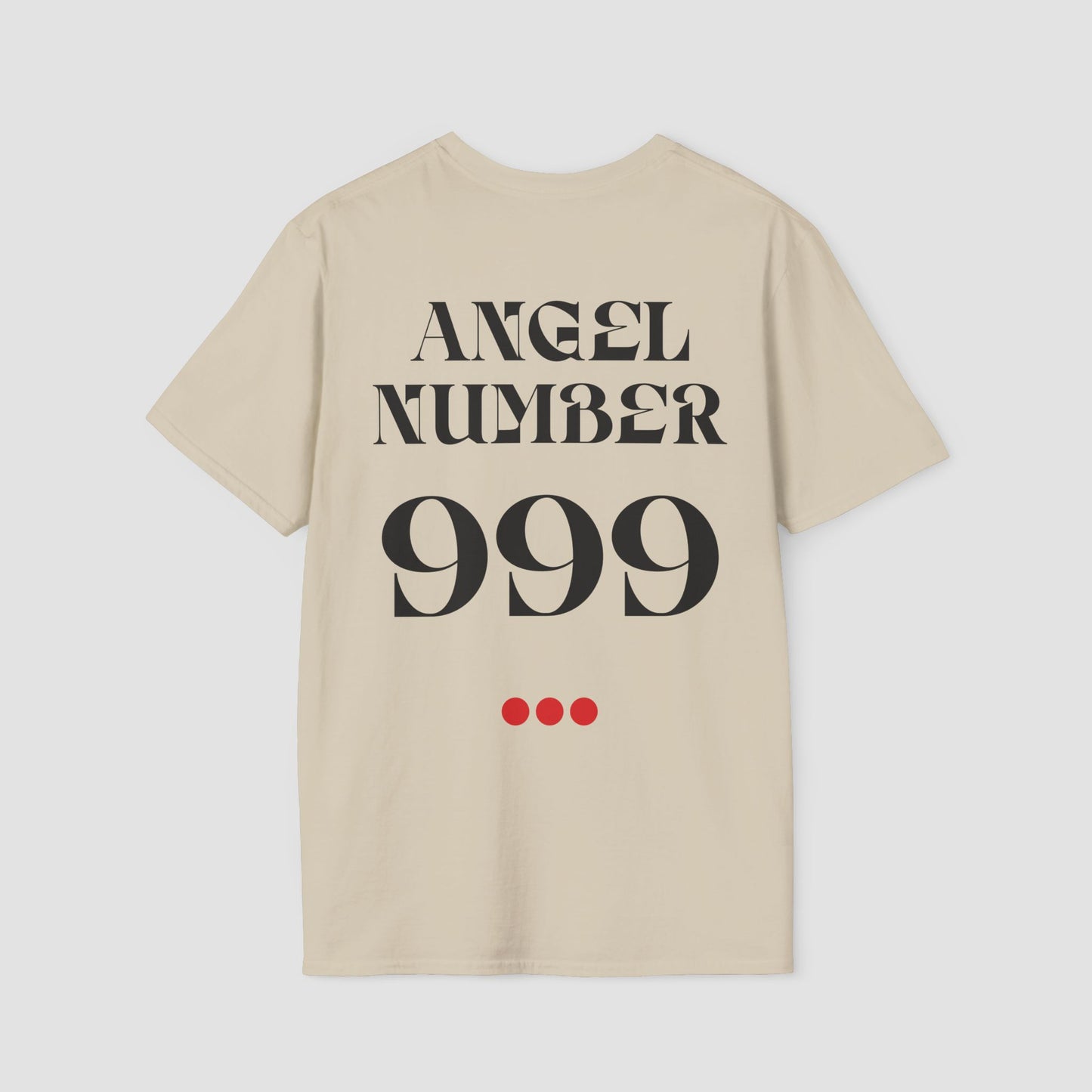 Sand colour Tee with Angel Number 999 depicted on the back in black print and underscored by 3 red dots. A slogan is written across the front saying, "Read the signs" .