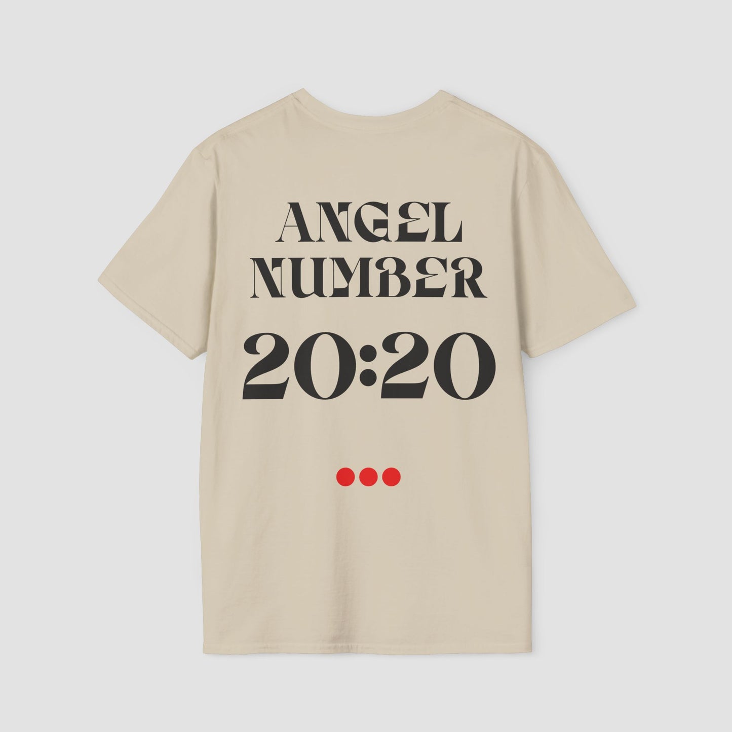 Sand coloured Tee with Angel Number 20:20 depicted on the back in black print and underscored by 3 red dots. A slogan is written across the front saying, "Read the signs" .