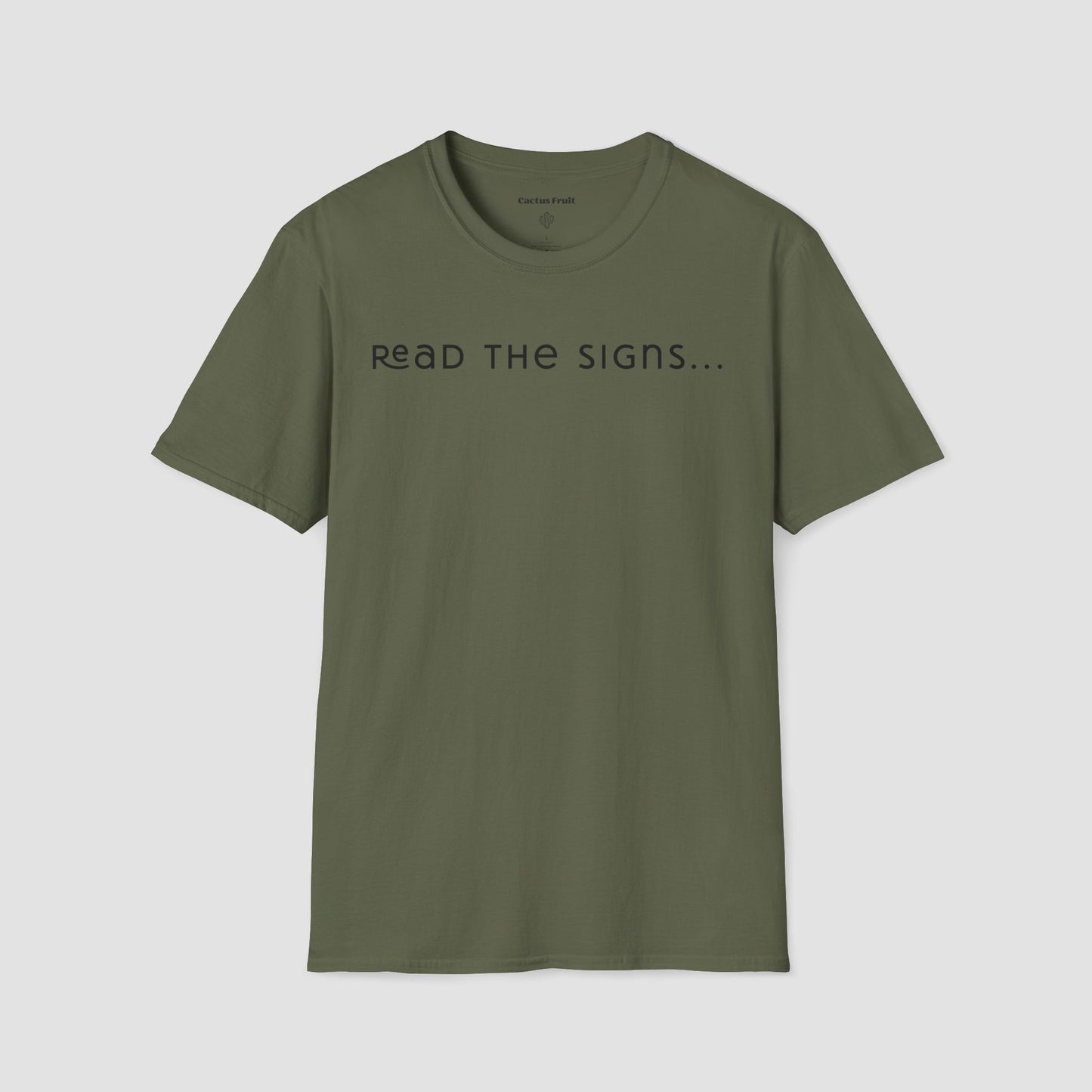 Green t-shirt with 'READ THE SIGNS...' text on a light gray background