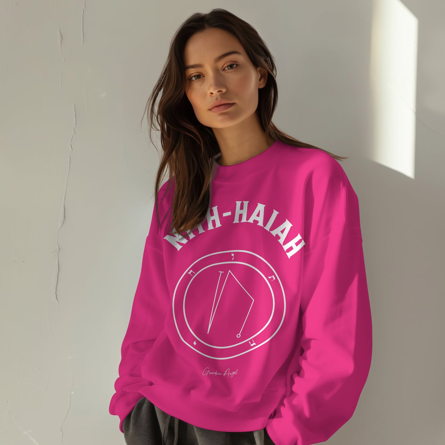 Model wearing a No.25 Shemhamphorasch Guardian Angel "Nith-Haiah" Sweatshirt in Heliconia Pink. With the seal of Nith-Haiah in white print on the front.