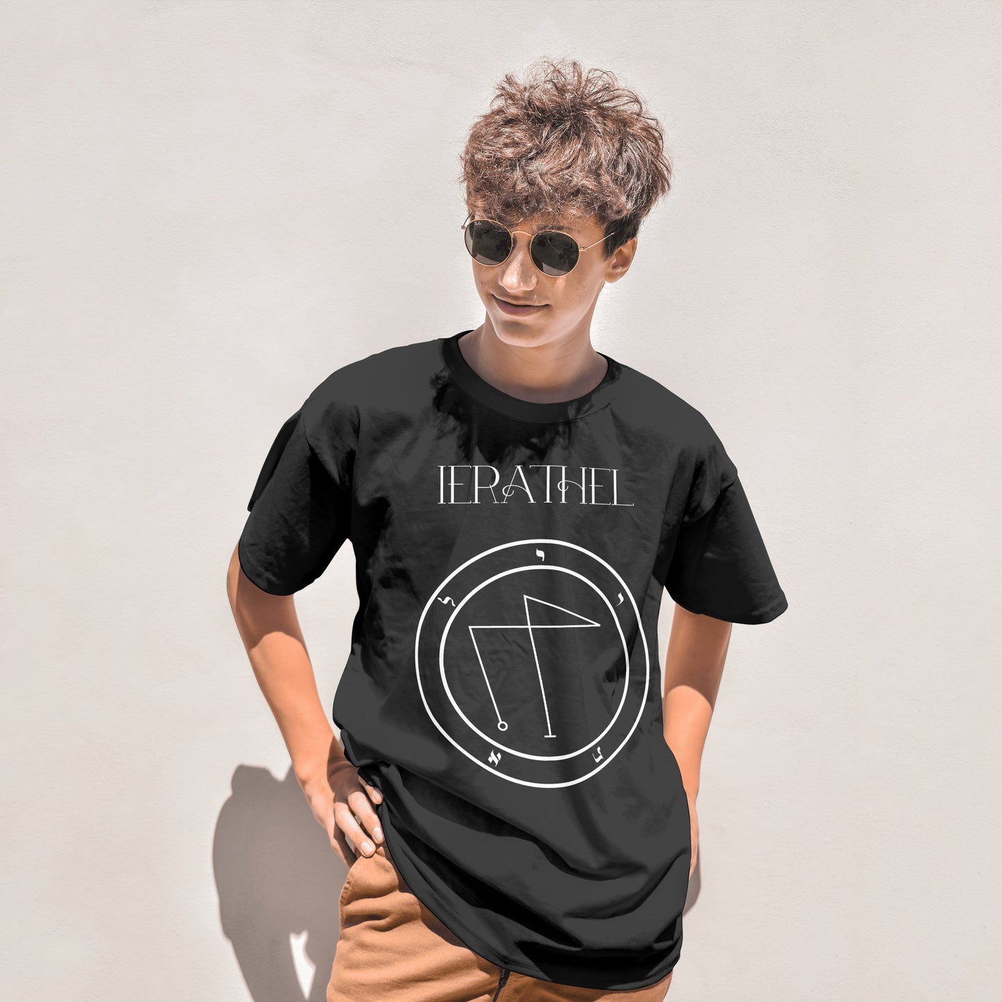 Model wearing No.27 Ierathel Shem Hamephorash Guardian Angel T-Shirt in black with symbol of Ierathel on front.