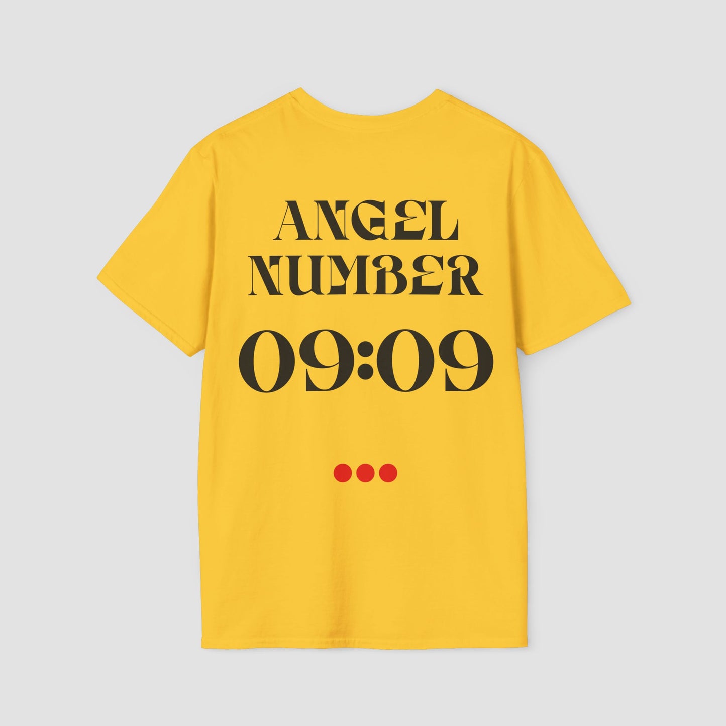 Yellow t-shirt with 'ANGEL NUMBER 09:09' printed on the back against a light gray background
