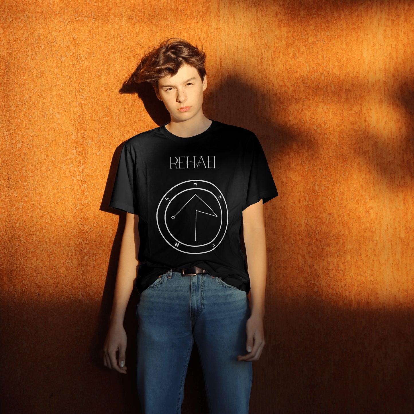 Model wearing No.39 Rehael Shem Hamephorash Guardian Angel T-Shirt in black with symbol of Rehael on front.