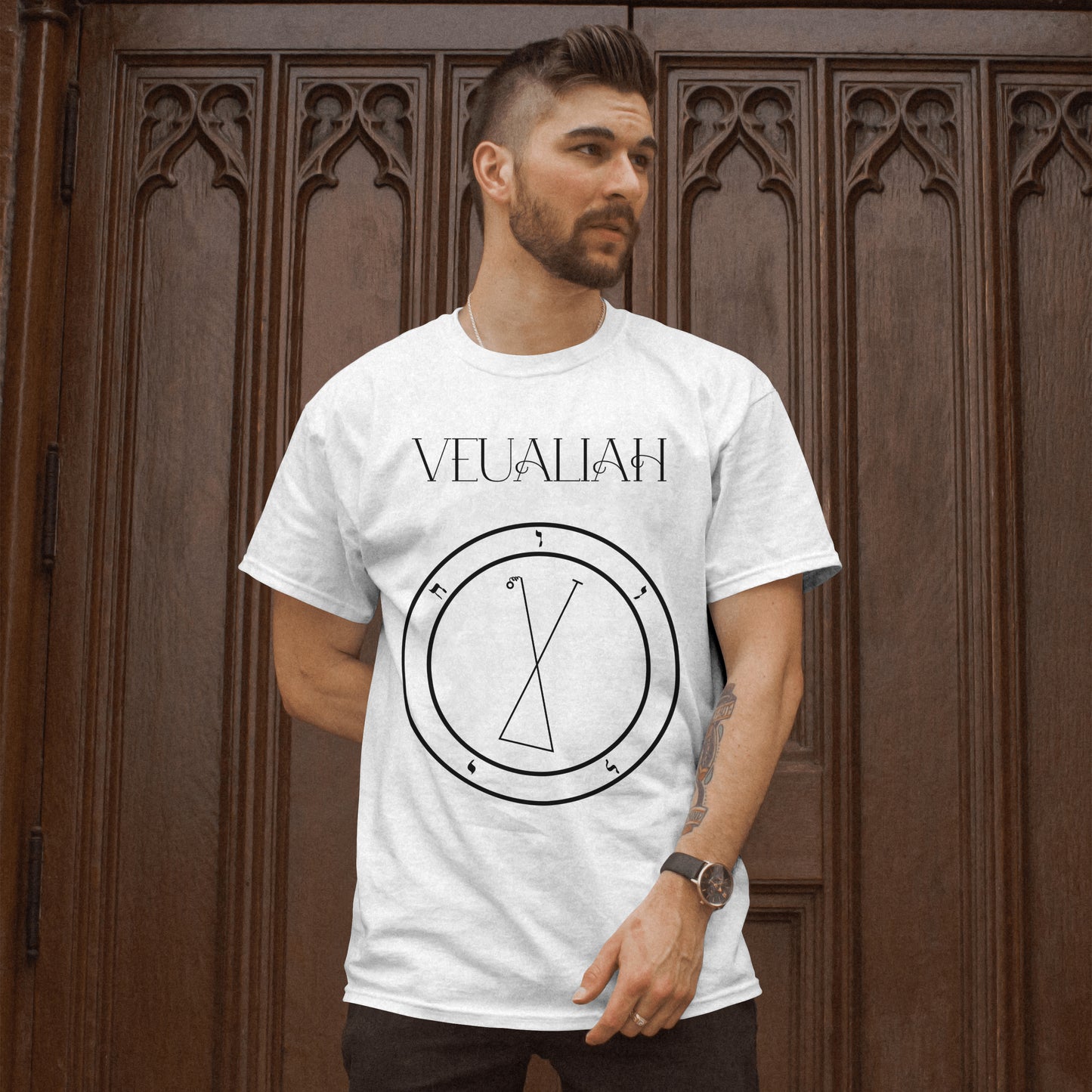 Model wearing No.43 Veualiah Shem Hamephorash Guardian Angel T-Shirt in White with symbol of Veualiah on front.