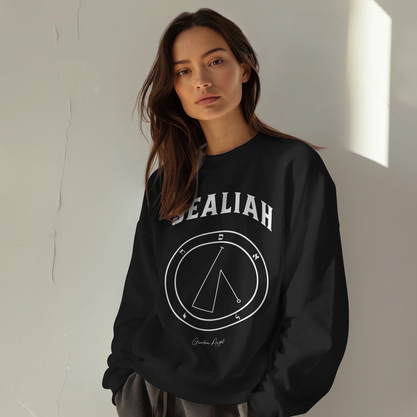 Model wearing a No.45 Shemhamphorasch Guardian Angel "Sealiah" Sweatshirt in Black. With the seal of Sealiah in white print on the front.