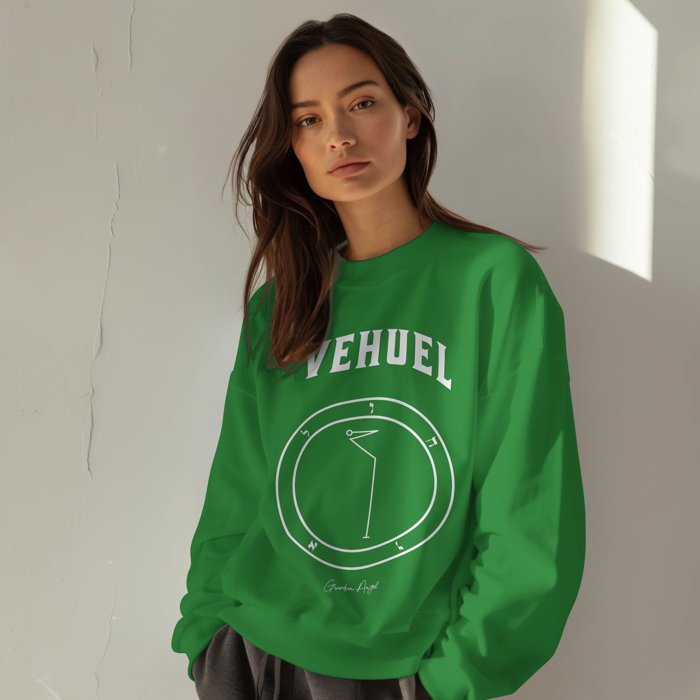 Model wearing a No.49 Shemhamphorasch Guardian Angel "Vehuel" Sweatshirt in Irish Green. With the seal of Vehuel in white print on the front.