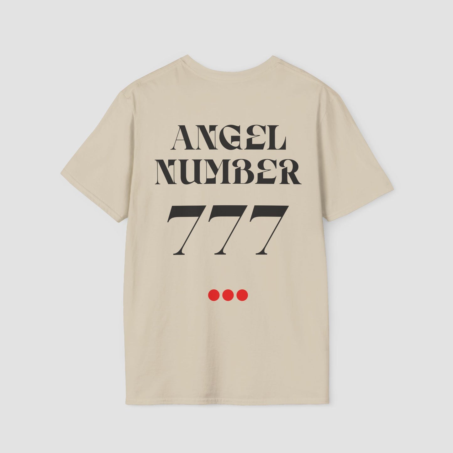 Sand coloured Tee with Angel Number 777 depicted on the back in black print and underscored by 3 red dots. A slogan is written across the front saying, "Read the signs" .