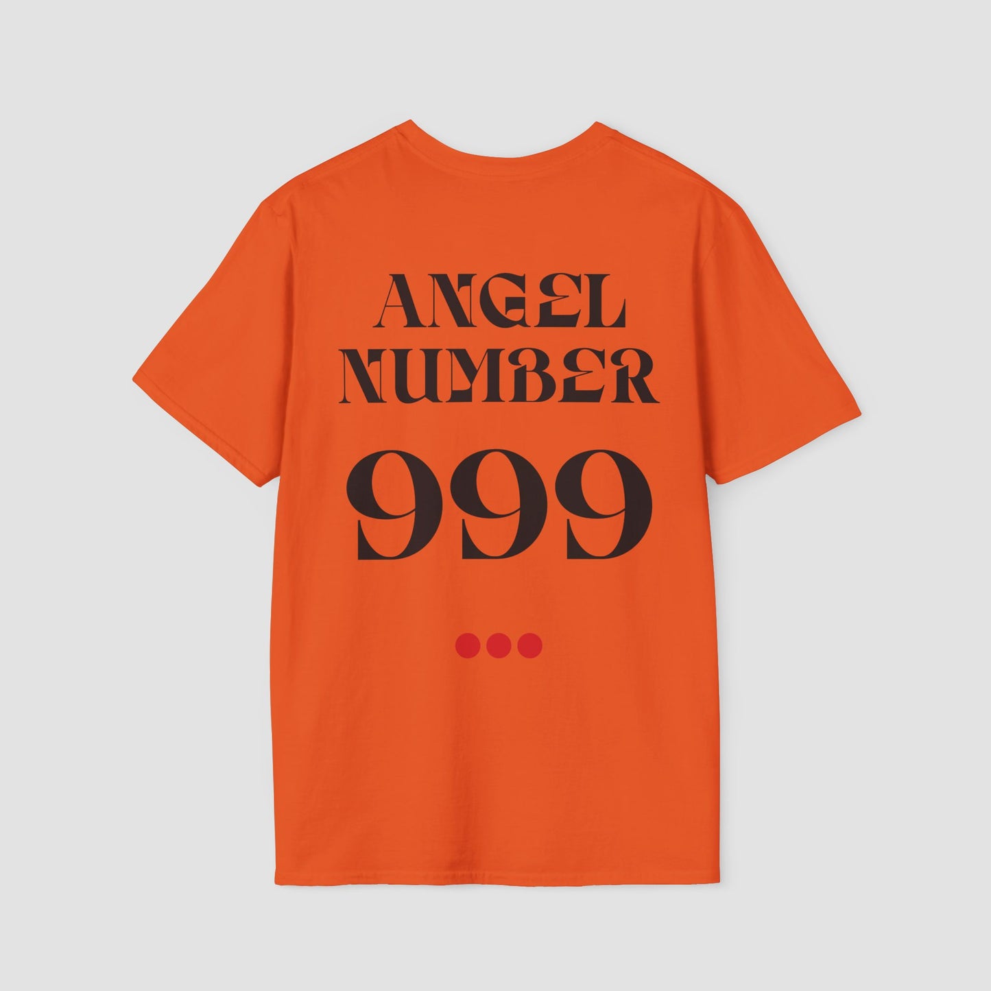 Orange Tee with Angel Number 999 depicted on the back in black print and underscored by 3 red dots. A slogan is written across the front saying, "Read the signs" .