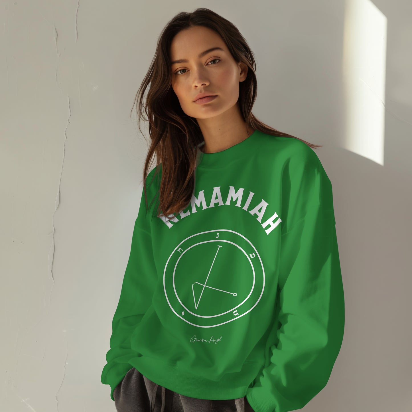 Model wearing a No.57 Shemhamphorasch Guardian Angel "Nemamiah" Sweatshirt in Irish Green. With the seal of Nemamiah in white print on the front.