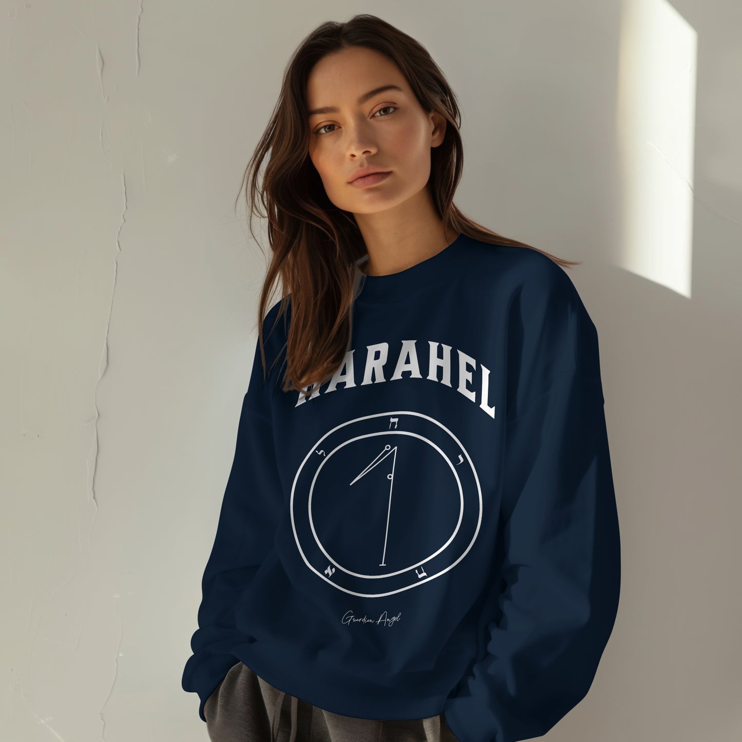 Model wearing a No.59 Shemhamphorasch Guardian Angel "Harahel" Sweatshirt in Navy Blue. With the seal of Harahel in white print on the front.