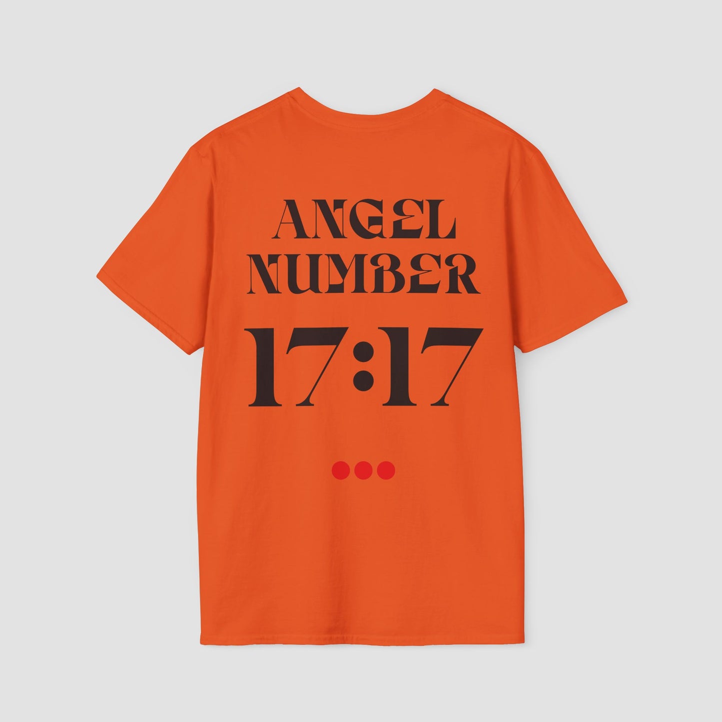 Orange Tee with Angel Number 17:17 depicted on the back in black print and underscored by 3 red dots. A slogan is written across the front saying, "Read the signs" .