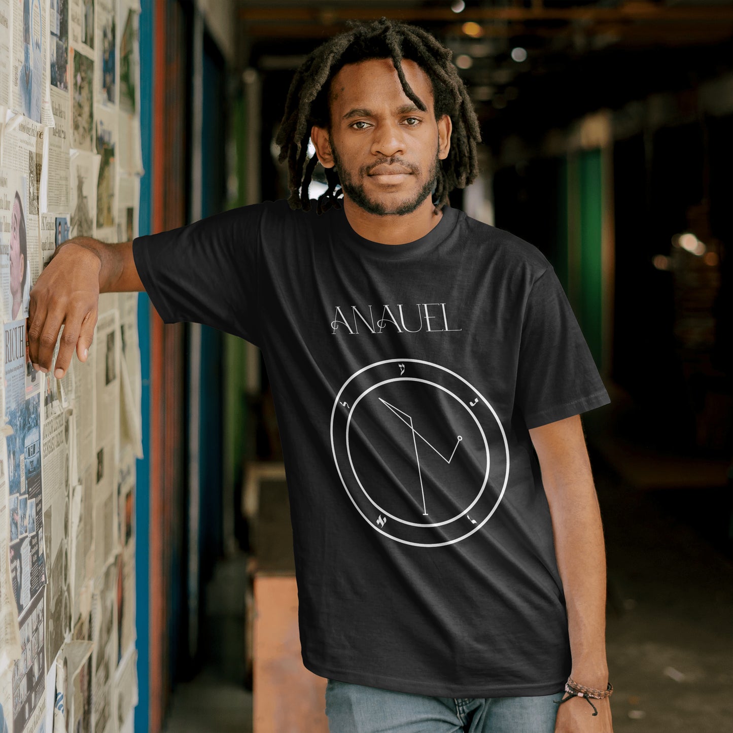 Model wearing No.63 Anauel Shem Hamephorash Guardian Angel T-Shirt in black with symbol of Damabiah on front.