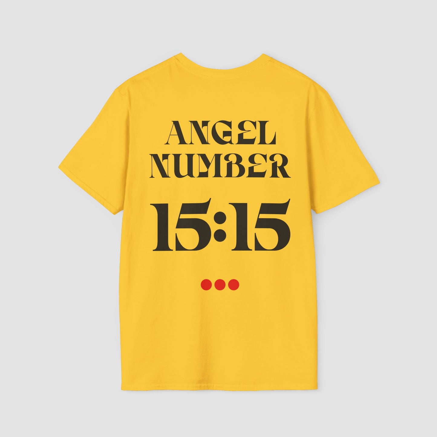 Yellow t-shirt with 'ANGEL NUMBER 15:15' printed on the back against a light gray background
