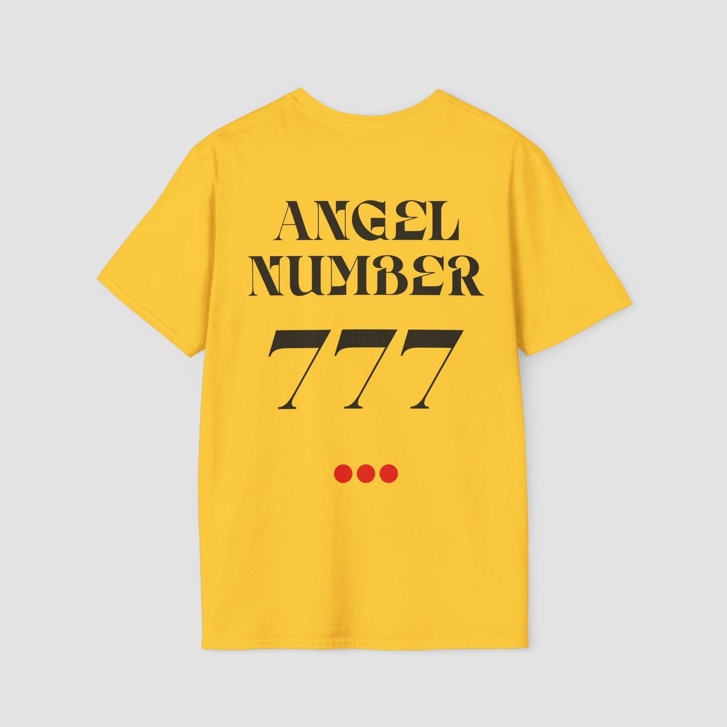 Yellow coloured Tee with Angel Number 777 depicted on the back in black print and underscored by 3 red dots. A slogan is written across the front saying, "Read the signs" .