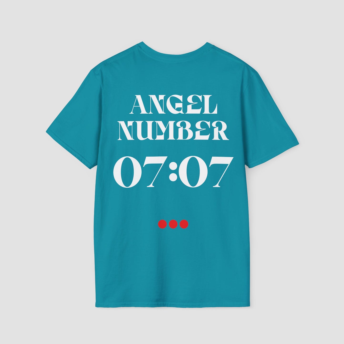Teal t-shirt with 'ANGEL NUMBER 07:07' printed on the back against a light gray background