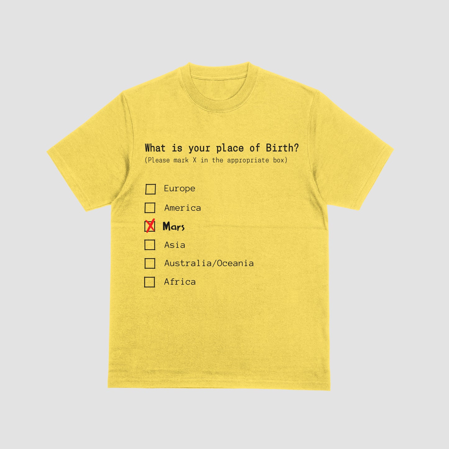 Yellow t-shirt with a humorous 'place of birth' checklist on a light gray background