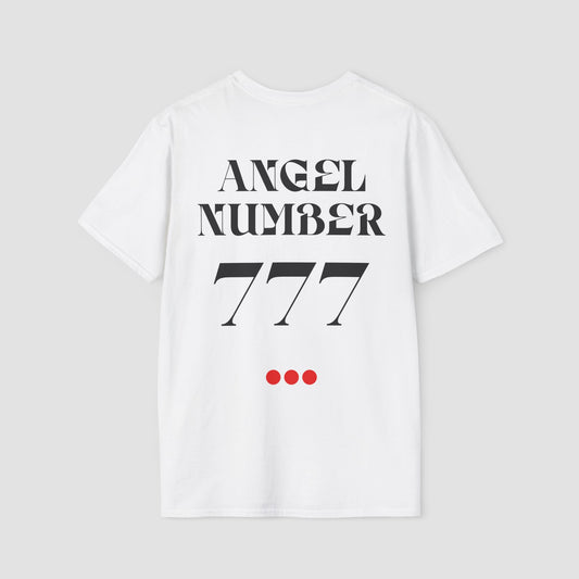 White coloured Tee with Angel Number 777 depicted on the back in black print and underscored by 3 red dots. A slogan is written across the front saying, "Read the signs" . 