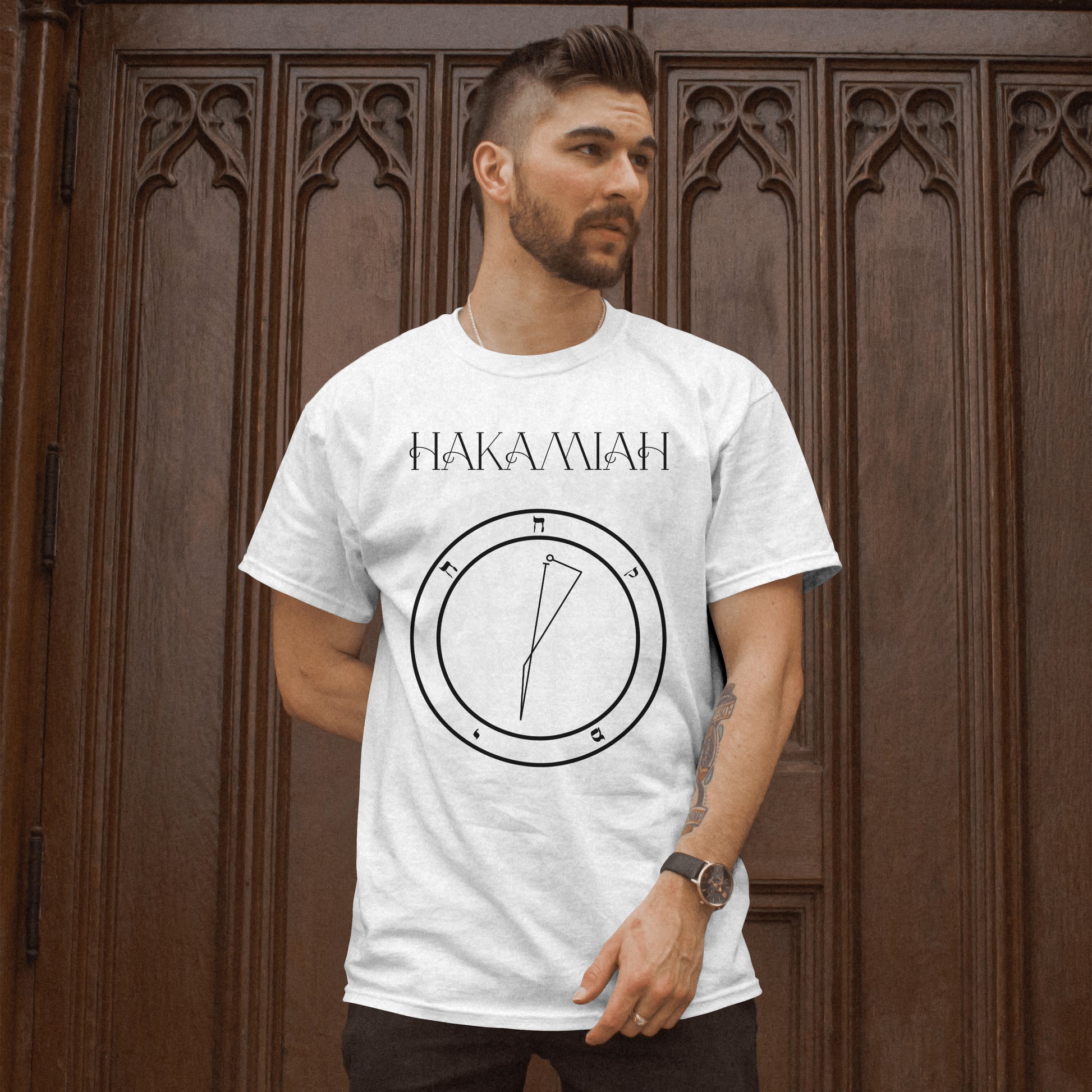 Model wearing No.16 HAKAMIAH Shem Hamephorash Guardian Angel T-Shirt in White with symbol of HAKAMIAH on front. 
