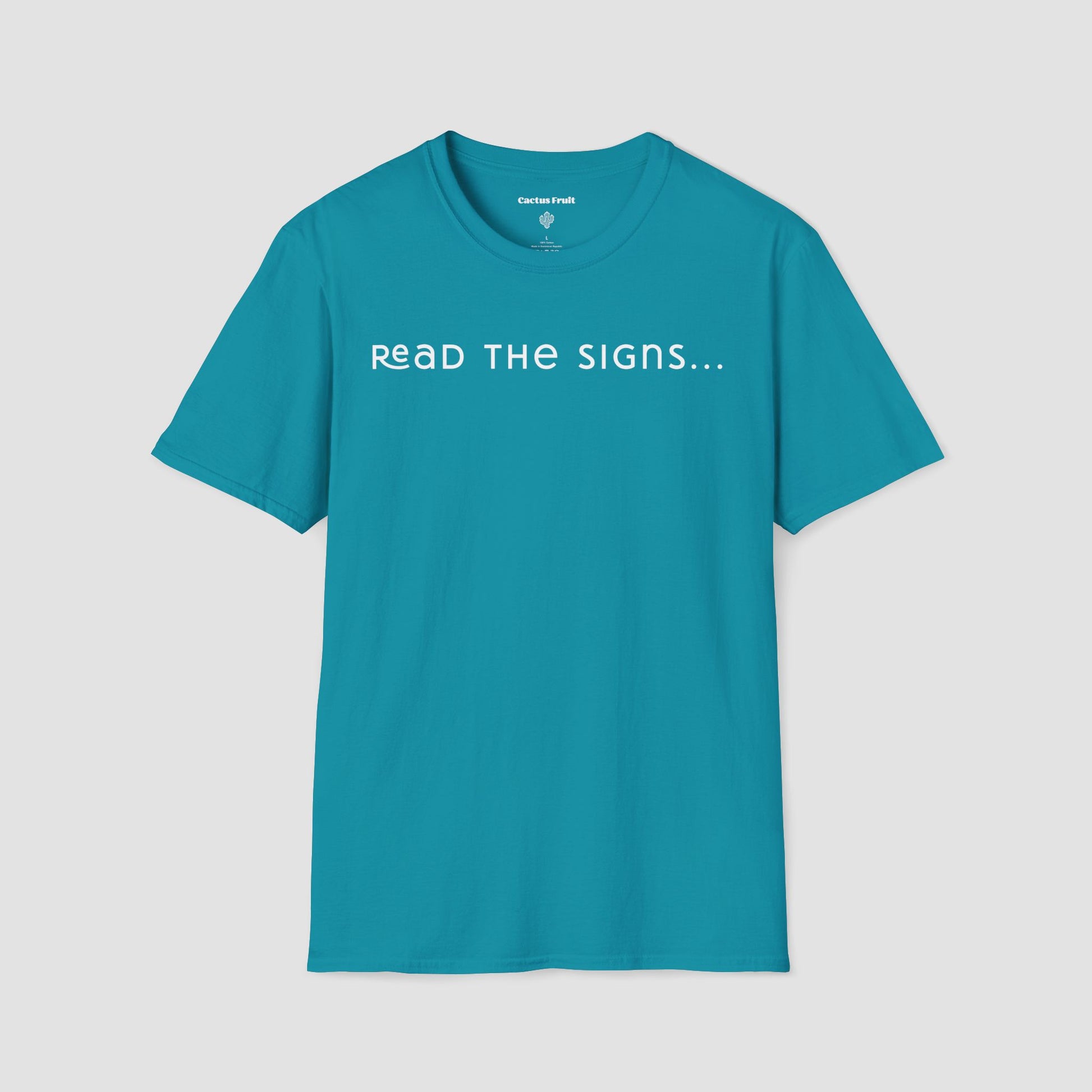 Teal t-shirt with 'Read the Signs...' text on a light gray background