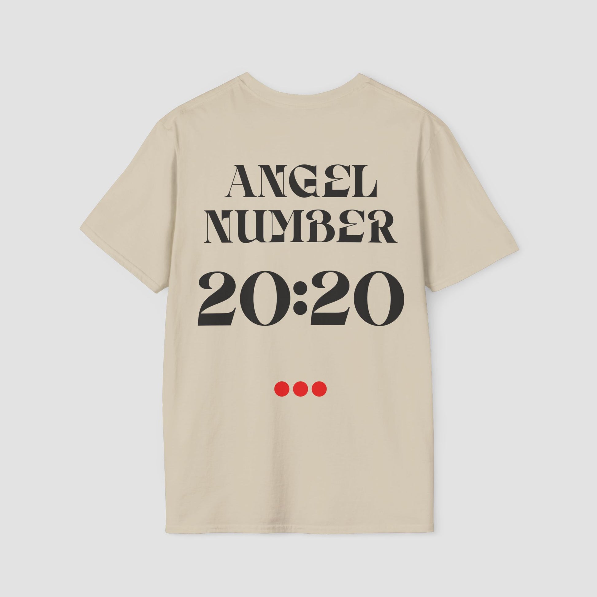 Sand coloured Tee with Angel Number 20:20 depicted on the back in black  print and underscored by 3 red dots. A slogan is written across the front saying, "Read the signs" . 