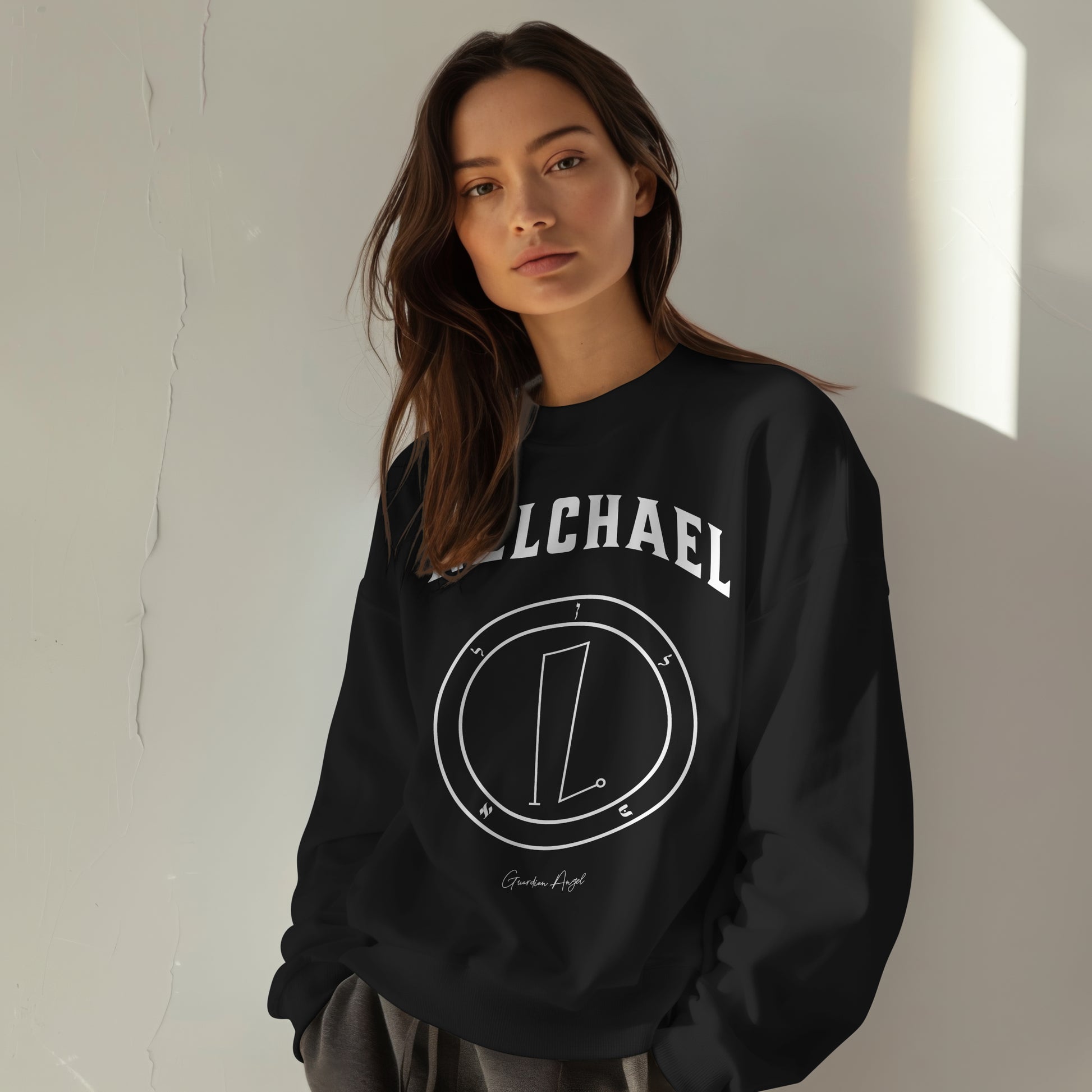 Model wearing aNo.21 Shemhamphorasch Guardian Angel "Nelchael"  Sweatshirt  in Black. With the seal of Nelchael in white print on the front. 
