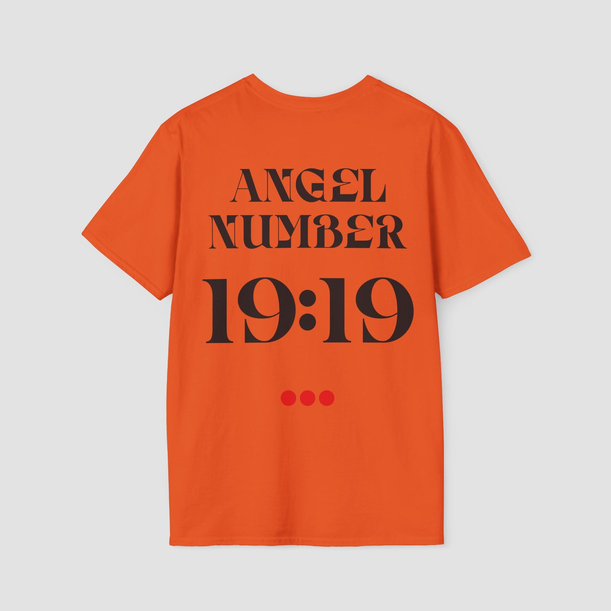 Orange Tee with Angel Number 19:19 depicted on the back in black print and underscored by 3 red dots. A slogan is written across the front saying, "Read the signs" .