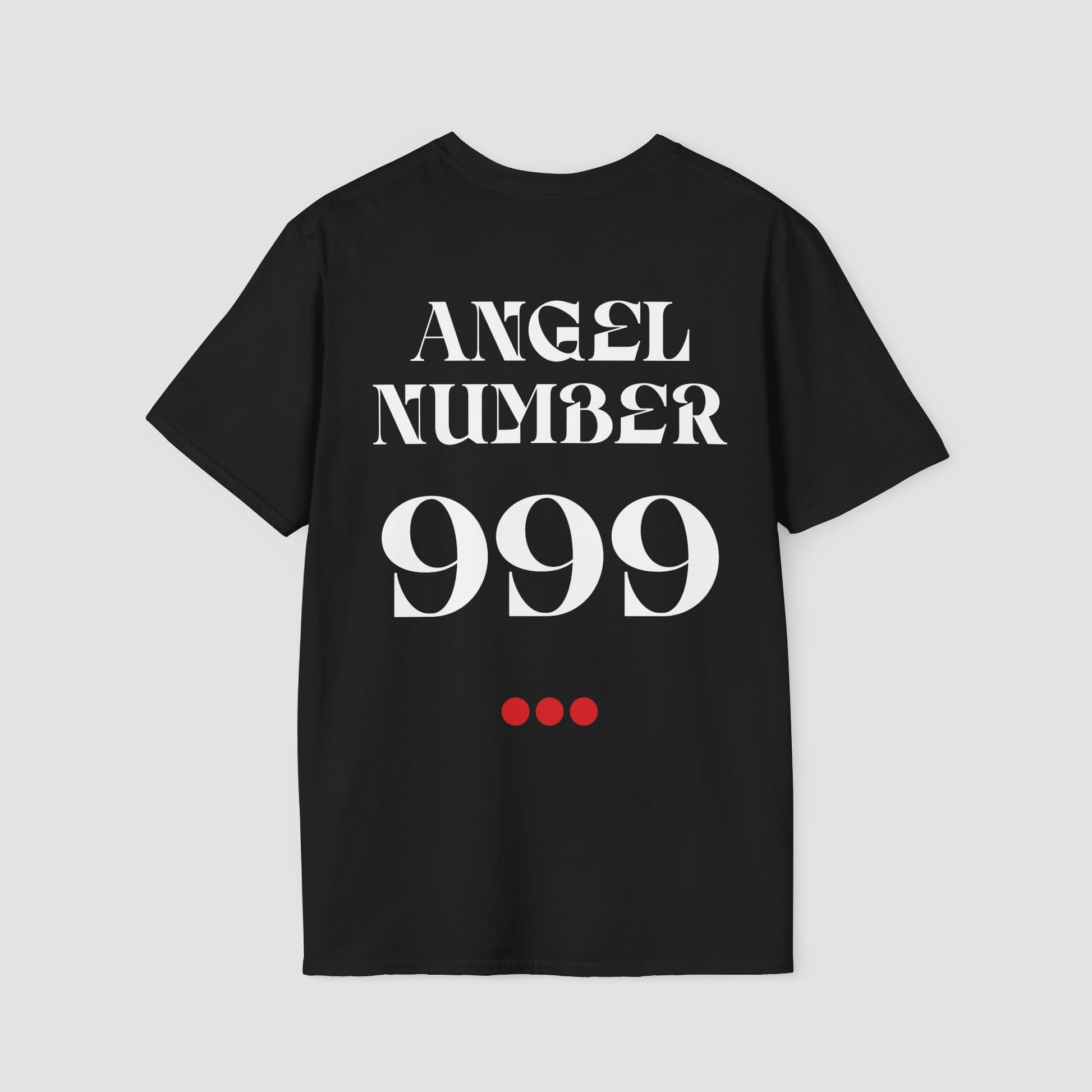 Black Tee with Angel Number 999 depicted on the back in white print and underscored by 3 red dots. A slogan is written across the front saying, "Read the signs" . 